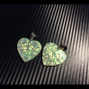 Silver resin heart earrings.
